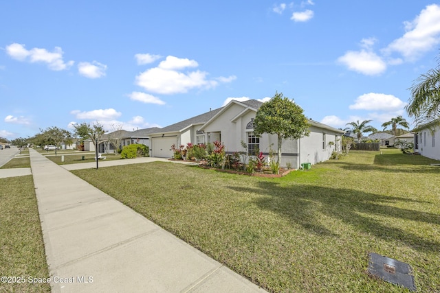 view of home's exterior featuring a yard and a garage