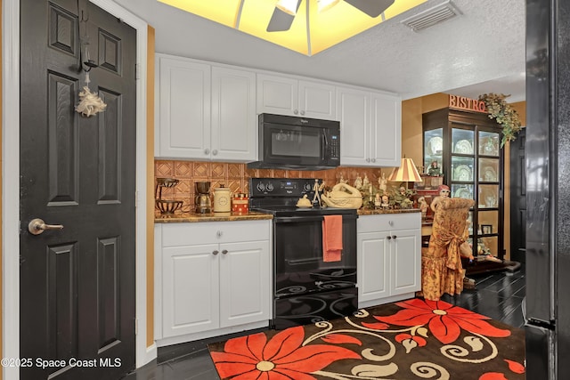 kitchen featuring white cabinetry, ceiling fan, decorative backsplash, and black appliances