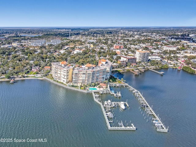 birds eye view of property featuring a water view