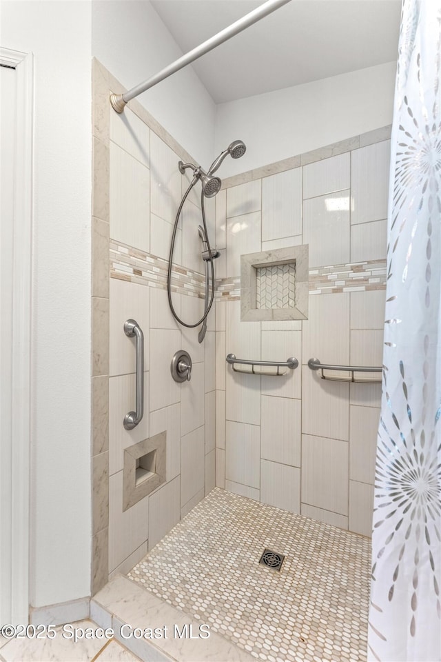 bathroom featuring walk in shower