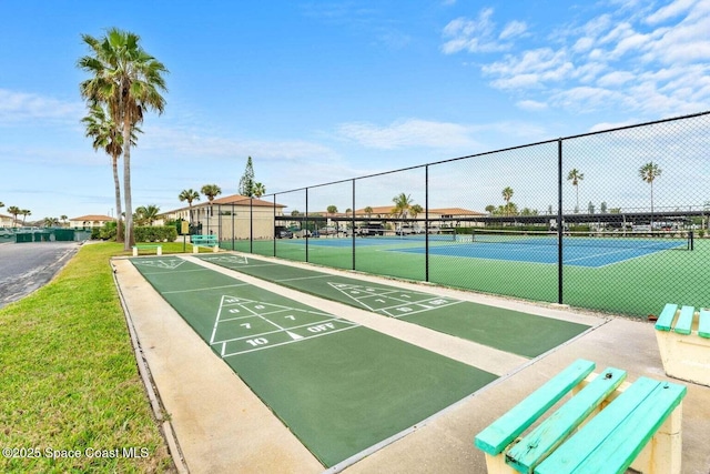 surrounding community with tennis court