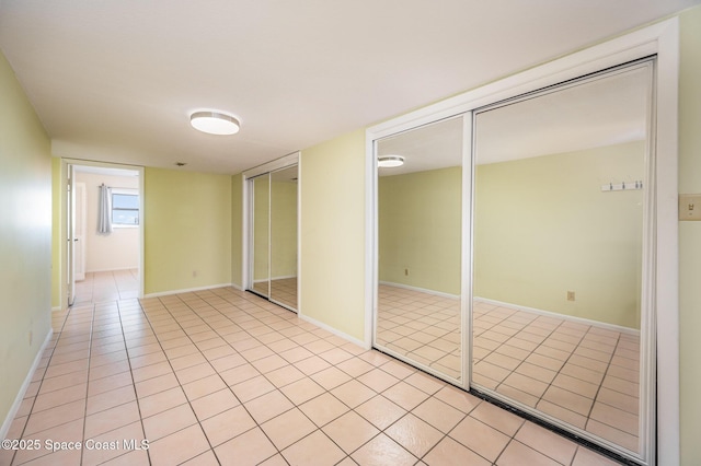 view of tiled spare room