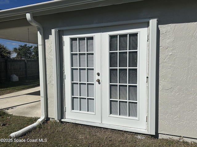 doorway to property featuring french doors