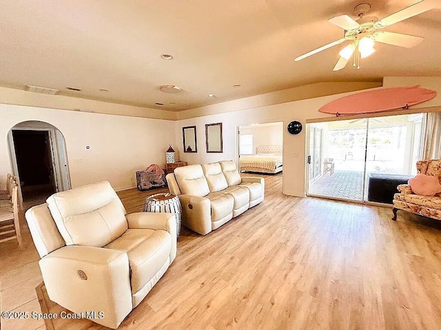 living room with ceiling fan and light hardwood / wood-style floors