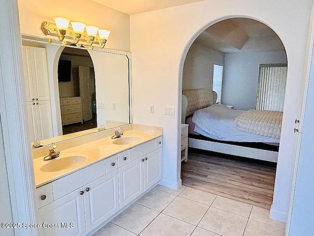 bathroom featuring vanity and tile patterned flooring