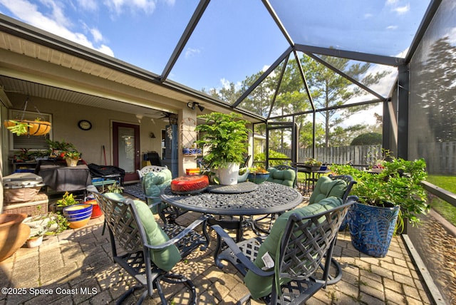 view of patio with a lanai