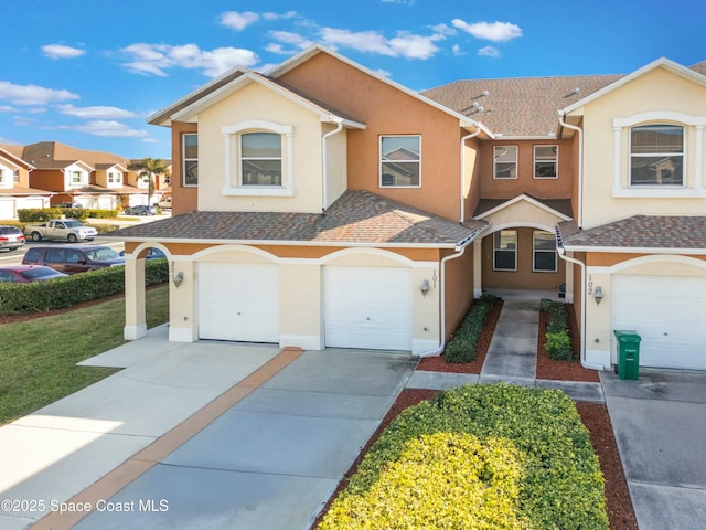 view of front of property with a garage