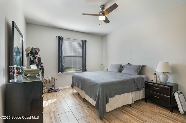 bedroom featuring ceiling fan and light hardwood / wood-style floors