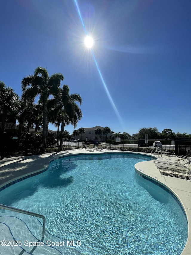 1035 Venetian Dr Unit 101, Melbourne, FL 32904 - community pool with a patio area