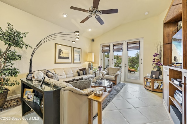 tiled living room with lofted ceiling, french doors, and ceiling fan