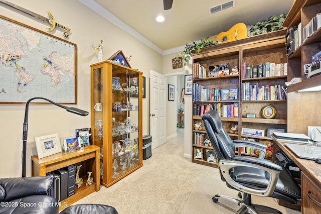 carpeted home office featuring ornamental molding