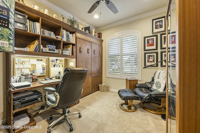 home office featuring ceiling fan, ornamental molding, and carpet floors