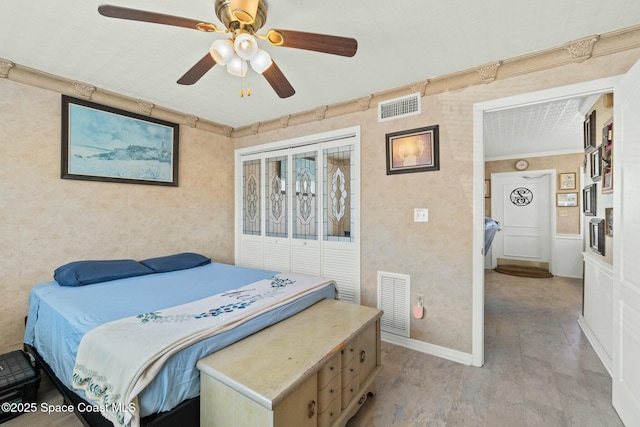 bedroom featuring crown molding, ceiling fan, and light wood-type flooring