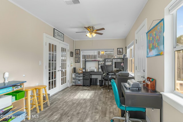 office area featuring crown molding, wood-type flooring, french doors, and ceiling fan