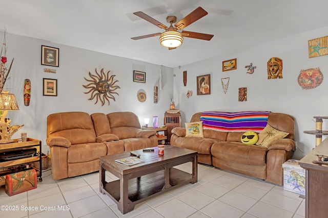 living room with light tile patterned floors and ceiling fan