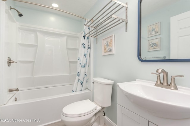 full bathroom with vanity, toilet, and shower / bath combo with shower curtain