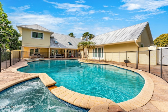 view of swimming pool featuring a patio