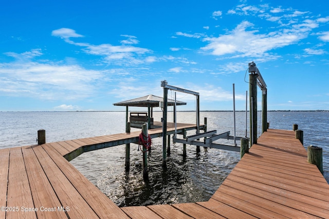 view of dock with a water view