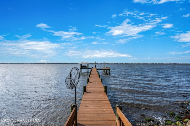 view of dock with a water view