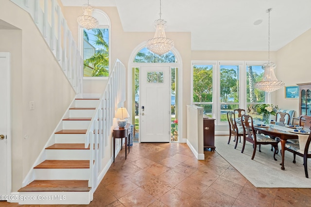 entryway featuring a chandelier