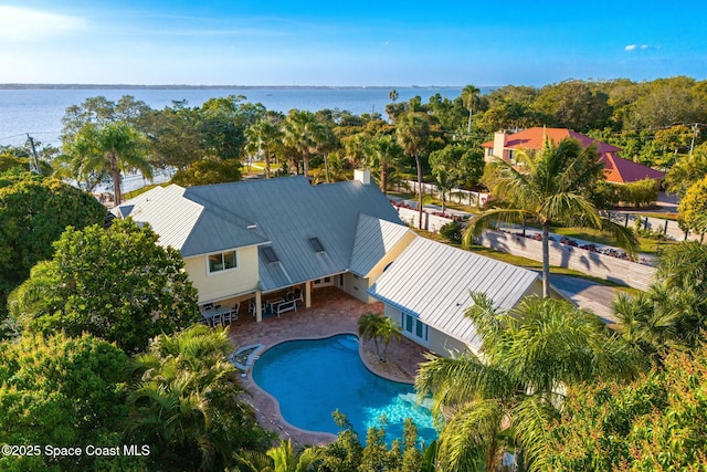 drone / aerial view featuring a water view