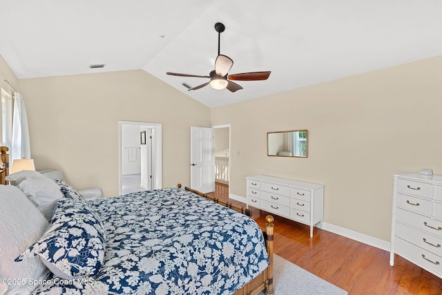 bedroom with vaulted ceiling, ceiling fan, and hardwood / wood-style floors