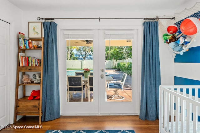 doorway to outside featuring wood-type flooring and french doors