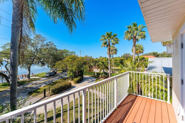 balcony featuring a water view