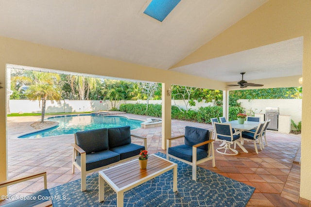 view of patio / terrace featuring area for grilling, a fenced in pool, grilling area, and ceiling fan