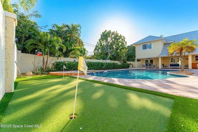 view of pool with a patio area