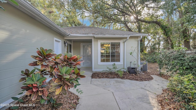 property entrance with a patio