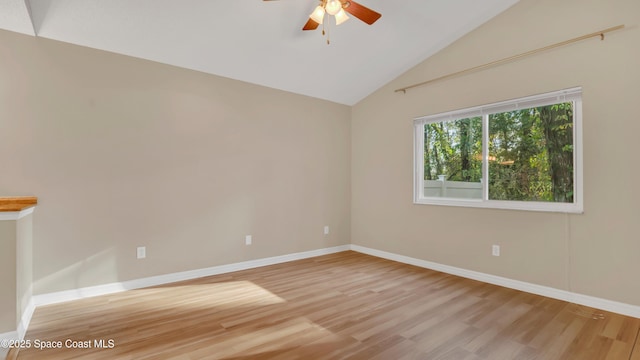 empty room with vaulted ceiling, light hardwood / wood-style floors, and ceiling fan