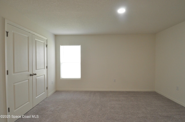 empty room with light carpet