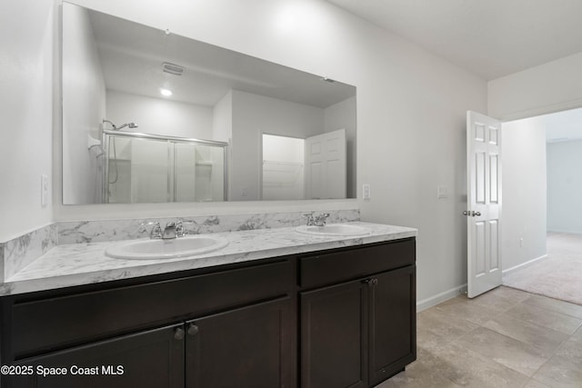 bathroom featuring vanity and walk in shower