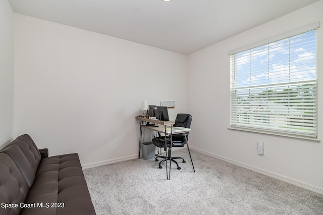 view of carpeted office space