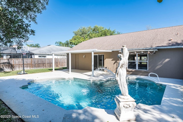 view of pool with a fenced in pool, a patio, and fence