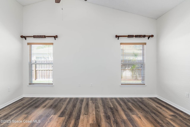spare room with ceiling fan, wood finished floors, and a healthy amount of sunlight
