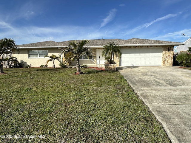 single story home featuring a garage and a front yard