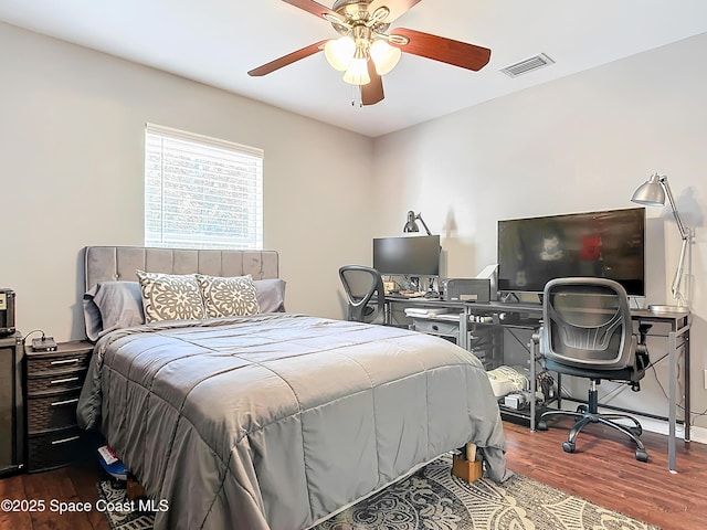 bedroom featuring ceiling fan and wood-type flooring