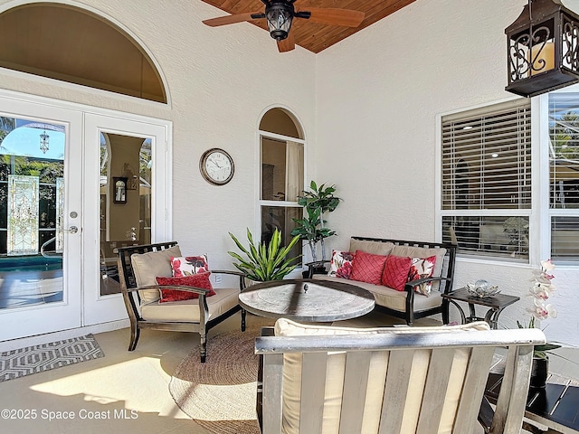 view of patio / terrace featuring french doors and ceiling fan