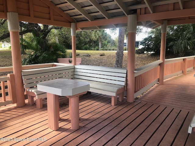 wooden deck with a gazebo