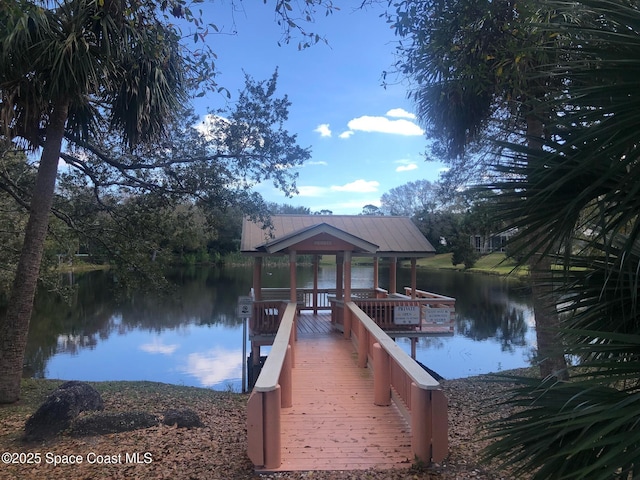 dock area featuring a gazebo and a water view