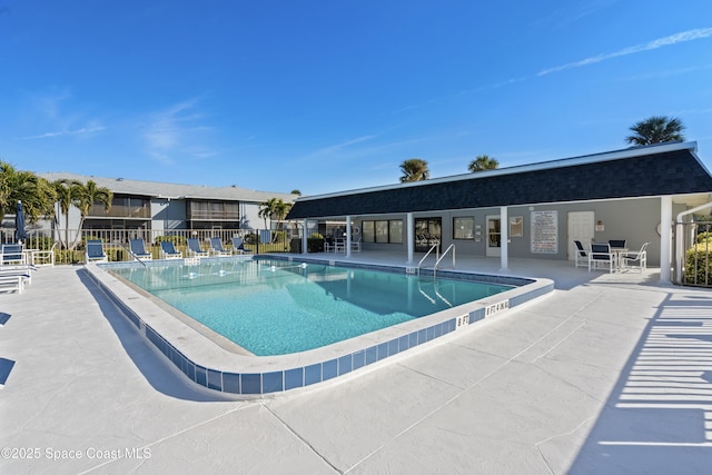 view of pool featuring a patio