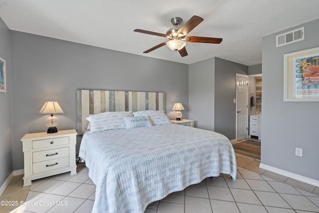 bedroom featuring light tile patterned floors and ceiling fan