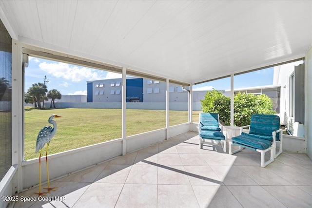 sunroom / solarium featuring a wealth of natural light