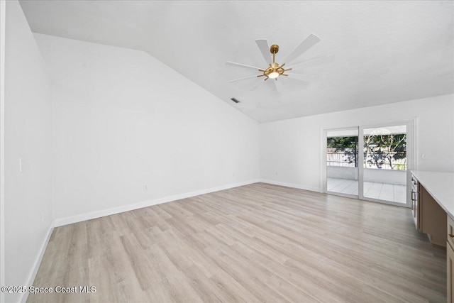 unfurnished living room with ceiling fan, lofted ceiling, and light hardwood / wood-style flooring