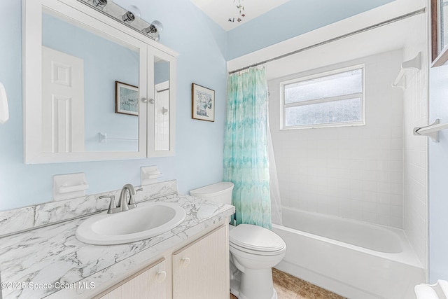 full bathroom featuring vanity, toilet, and shower / bath combo with shower curtain