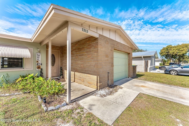 doorway to property featuring a lawn