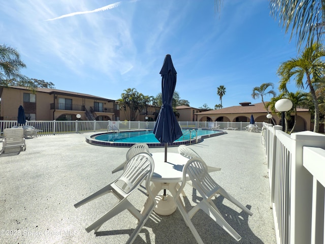 view of pool with a patio area