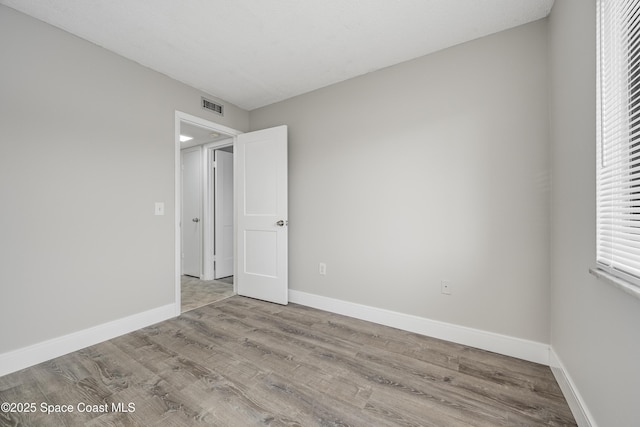 unfurnished bedroom featuring light hardwood / wood-style flooring